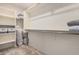 The walk-in closet has ample built-in shelving and clothing rods for optimal organization at 4044 S 58Th Ln, Phoenix, AZ 85043