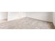 Bedroom showcasing neutral walls, carpeted floors, and an ensuite bathroom at 42920 W Palo Amarillo Rd, Maricopa, AZ 85138