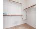 Walk-in closet with rods and shelves providing ample storage space at 44158 W Canyon Creek Dr, Maricopa, AZ 85139