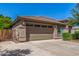 Single-Gathering home featuring a two-car garage and a spacious driveway at 44158 W Canyon Creek Dr, Maricopa, AZ 85139