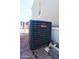 Goodman AC Unit sits outside the home, ensuring efficient cooling during the warm seasons at 501 E Ray Rd # 36, Chandler, AZ 85225