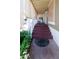 Covered front porch with a set of red stairs leading to the front door, creating a warm welcome at 501 E Ray Rd # 36, Chandler, AZ 85225
