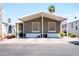 Charming home featuring desert landscaping, covered parking, and a welcoming facade at 501 E Ray Rd # 36, Chandler, AZ 85225