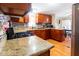 Modern kitchen featuring granite countertops, stainless steel appliances, and ample lighting at 501 E Ray Rd # 36, Chandler, AZ 85225