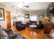 Inviting living room featuring hardwood floors, comfortable seating, and natural light at 501 E Ray Rd # 36, Chandler, AZ 85225