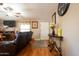 Cozy living room featuring a ceiling fan, modern furniture, and natural light at 501 E Ray Rd # 36, Chandler, AZ 85225