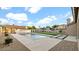 Backyard featuring a stunning pool and patio combination, a pristine lawn, and elegant landscaping at 5103 E Juniper Ave, Scottsdale, AZ 85254