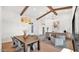 Dining Room featuring high vaulted ceilings, decorative chandelier, and bright natural light at 5103 E Juniper Ave, Scottsdale, AZ 85254