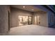 Covered patio with sliding glass doors, offering a glimpse of the home's stylish interior at 5103 E Juniper Ave, Scottsdale, AZ 85254