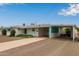 This single-story residence features a carport, desert landscaping, and a welcoming facade at 5317 E Colby St, Mesa, AZ 85205