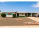 Charming single-story home featuring a low-maintenance yard, covered carport, and stylish curb appeal at 5317 E Colby St, Mesa, AZ 85205