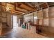 Organized garage with storage shelves, open door, and boxes ready to move in or out for optimal convenience at 5317 E Colby St, Mesa, AZ 85205