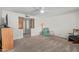 Spacious living room with neutral carpet and lots of natural light at 5317 E Colby St, Mesa, AZ 85205