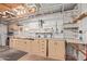 Spacious work area featuring cabinets, countertops, pegboard, and ample storage for tools and projects at 5317 E Colby St, Mesa, AZ 85205