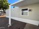Exterior view of the home with covered car-port at 535 S Alma School Rd # 37, Mesa, AZ 85210