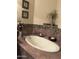 Spacious bathroom with relaxing soaking tub, elegant tile and decor at 5350 E Deer Valley Dr # 3267, Phoenix, AZ 85054