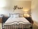 Inviting bedroom with a cozy bed, decorative wall art, and bedside tables at 5350 E Deer Valley Dr # 3267, Phoenix, AZ 85054