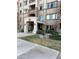 Elegant building entrance featuring stone accents and manicured landscaping, creating an inviting curb appeal at 5350 E Deer Valley Dr # 3267, Phoenix, AZ 85054