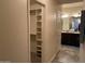 Spacious walk-in closet featuring shelving for optimal storage and organization at 5350 E Deer Valley Dr # 3267, Phoenix, AZ 85054