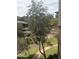 Serene outdoor space with lush landscaping, meandering path, and residential buildings at 5350 E Deer Valley Dr # 3267, Phoenix, AZ 85054