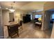 Open-concept living area with natural light and dining space at 5350 E Deer Valley Dr # 3267, Phoenix, AZ 85054