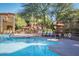 Relaxing pool area featuring comfortable lounge chairs and shade at 5350 E Deer Valley Dr # 3267, Phoenix, AZ 85054