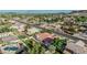 Bird's eye view showcasing a home with a well-manicured backyard, pool, and playground in a residential neighborhood at 5602 W Alameda Rd, Glendale, AZ 85310