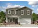 Charming two-story home with a covered porch and desert landscaping at 5826 W Sunrise Dr, Laveen, AZ 85339