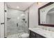 Newly renovated bathroom with marble countertops, tiled shower, and modern vanity at 6244 E Inglewood St, Mesa, AZ 85205