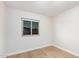 Cozy bedroom with a large window offering ample natural light and tranquil views at 6244 E Inglewood St, Mesa, AZ 85205