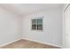 Bedroom with natural light, window and wood-look flooring at 6244 E Inglewood St, Mesa, AZ 85205