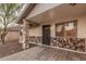 Front porch view with stone accents, window and door at 6244 E Inglewood St, Mesa, AZ 85205