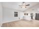 Open-concept living space showing vinyl flooring, and a view into the kitchen at 6244 E Inglewood St, Mesa, AZ 85205