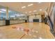 Modern basketball court with hardwood floors, glass windows, and ample lighting for recreational activities at 7157 E Rancho Vista Dr # 5004, Scottsdale, AZ 85251