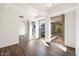 Bright bedroom featuring hardwood floors, mirrored closet and large windows, offering lots of natural light at 7157 E Rancho Vista Dr # 5004, Scottsdale, AZ 85251
