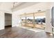 Bedroom with expansive windows offering city views, closet and hardwood floors at 7157 E Rancho Vista Dr # 5004, Scottsdale, AZ 85251