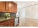 Well-lit kitchen with granite countertops, stainless steel appliances, and tiled floors at 7157 E Rancho Vista Dr # 5004, Scottsdale, AZ 85251