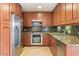 Modern kitchen featuring stainless steel appliances, granite countertops, and tiled backsplash at 7157 E Rancho Vista Dr # 5004, Scottsdale, AZ 85251