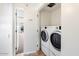 Convenient laundry room includes washer and dryer, providing ease for laundry tasks at 7157 E Rancho Vista Dr # 5004, Scottsdale, AZ 85251
