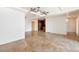 Expansive open-concept living and dining area with tile floors and modern light fixtures at 7157 E Rancho Vista Dr # 5004, Scottsdale, AZ 85251