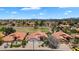 Neighborhood aerial view showcasing well-manicured lawns and lovely houses in a desirable location at 7464 E Lompoc Ave, Mesa, AZ 85209