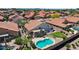 Backyard paradise featuring a pool, patio area, and desert landscaping, promising relaxation and enjoyment at 7464 E Lompoc Ave, Mesa, AZ 85209