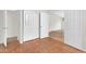 Hallway with tile floors, closet and entry to living space with matching tile at 7464 E Lompoc Ave, Mesa, AZ 85209