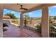 The spacious tiled patio area is perfect for entertaining guests with a lovely view of the well-manicured backyard at 7464 E Lompoc Ave, Mesa, AZ 85209