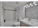 Bright bathroom with a shower-tub combo, modern vanity, and decorative lighting at 7625 E Camelback Rd # B244, Scottsdale, AZ 85251