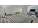 Cozy bedroom featuring neutral tones, natural light and view to office space at 7625 E Camelback Rd # B244, Scottsdale, AZ 85251