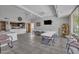 Spacious clubhouse with a kitchen, dining area, and comfortable seating at 7625 E Camelback Rd # B244, Scottsdale, AZ 85251
