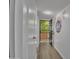 This is the entryway of the unit with neutral paint and wooden flooring at 7625 E Camelback Rd # B244, Scottsdale, AZ 85251
