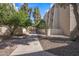 Well-maintained exterior with mature trees and meticulously manicured landscaping at 7625 E Camelback Rd # B244, Scottsdale, AZ 85251