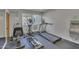 This is a gym with a treadmill, elliptical machine, exercise bike, and water fountain at 7625 E Camelback Rd # B244, Scottsdale, AZ 85251